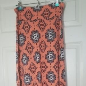 pink and black long body-con skirt